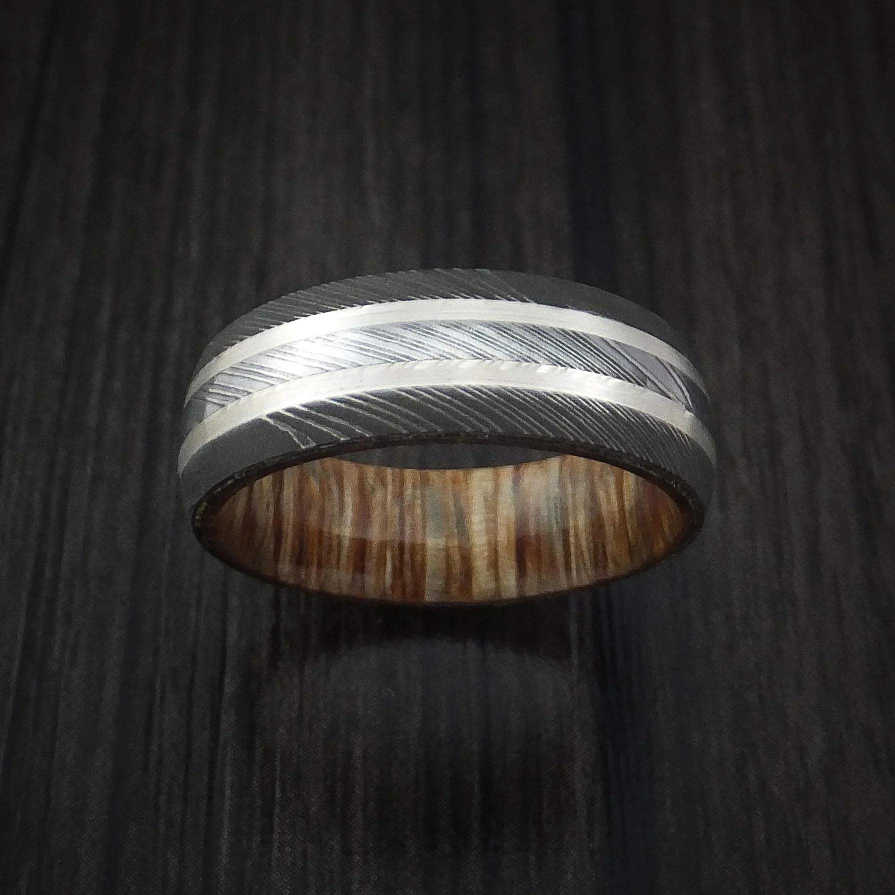 Damascus Steel Men's Ring with Silver Inlays and Teak Hardwood Sleeve - Image 2